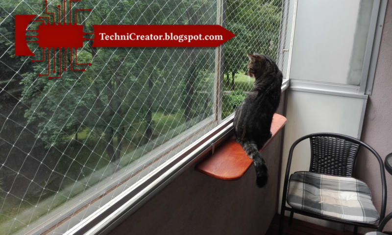 zawieszana półka na balkon dla kota